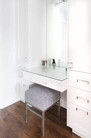 makeup vanity with gray stool