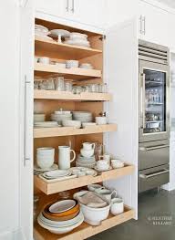 Cabinet manufactures build kitchen cabinet drawers out of all types of materials including, melamine, mdf, oak, maple, pine and every wood species imaginable. Slide Out Kitchen Pantry Drawers Inspiration The Inspired Room