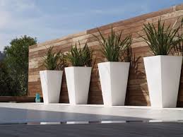 outdoor planter with artificial flowers