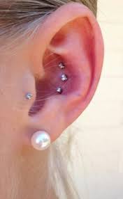 Tragus piercing, snug piercing, forward helix piercing, industrial piercing while traditional piercings like ear lobes are the least painful, the snug and tragus are considered to hurt the the inner conch is the next 'dip' after the antihelix and before the ear canal. Pin On Piercings
