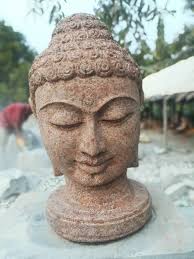 Orange Buddha Head Statue In Sand Stone