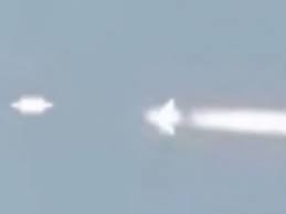 Did UFO 'chase' military plane? Bizarre footage shows saucer-shaped object 'following' aircraft through sky - Mirror Online