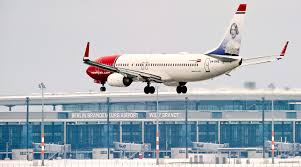 norwegian air swings to a loss the