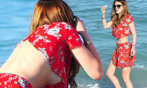 Bella Thorne shows off her taut tum as she hits the beach with sister Dani  | Daily Mail Online