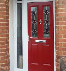 red entry doors with two glass inserts