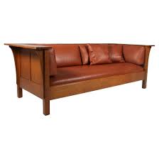 antique mission oak couch on