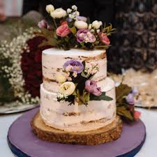 Final wedding cake, decorated with roses and monogram. 5 Small Cake Ideas To Make Your Intimate Wedding Even More Memorable Pinkvilla
