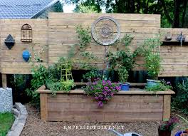 diy raised garden bed with privacy fence