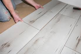 worker making laminate flooring