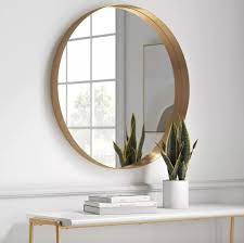 A Circular Decorative Wall Mirror With
