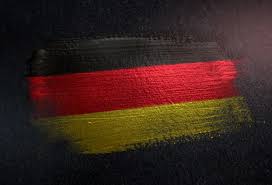 Car displays a german flag as a woman walks by june 19, 2006 in berlin, germany. 1 000 Germany Flag Pictures