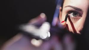 Image result for woman with makeup behind a mirror