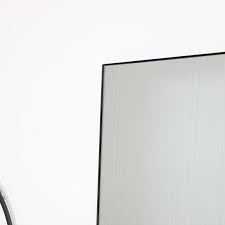 large black thin framed leaner mirror