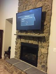 mounting a tv on brick fireplaces the