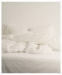 log in white bedding white sheets