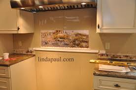 Mural And Medallion Kitchen Backsplash