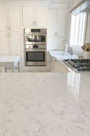 And thea's entire kitchen makeover (including updated lighting, rug, cabinet hardware and all decor and accessories) cost only $997. How To Choose The Right White Quartz For Kitchen Countertops Hello Lovely