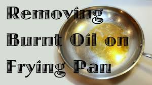 removing burnt oil from a frying pan