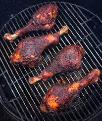 bbq turkey legs over the fire cooking