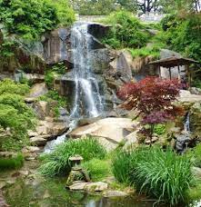The Waterfall In The Japanese Garden At