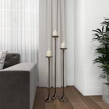 black aluminum tall candle holder