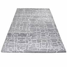 white hand knotted abstract area rug