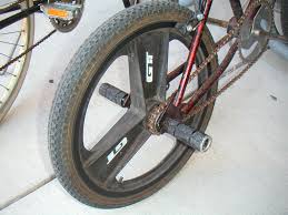 can you put pegs on a mountain bike? A Bike's rear wheel with pegs
