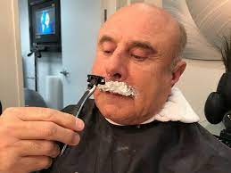 dr phil seems to shave iconic mustache