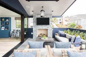 Gray Stone Deck Fireplace With Tv