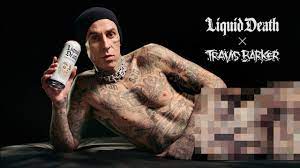 Travis Barker Goes Nude For Liquid Death's 'Enema Of The State' Kit –  Hollywood Life