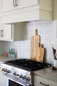 Install a new pressed tin backsplash above is a perfect project in this regard. Gray Tin Kitchen Backsplash Tiles Design Ideas