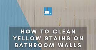 clean yellow stains on bathroom walls