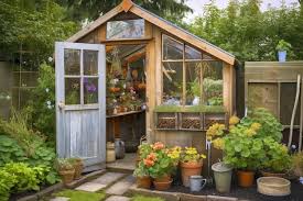 A Garden Shed With A Greenhouse Window