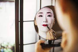 geisha or maiko with a hair and make up