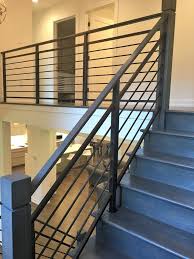 As such, it is a great material if your home is surrounded by nature. Amanda Horizontal Steel Railing With Wooden Newel Posts Contemporary Staircase Philadelphia By Capozzoli Stairworks Houzz