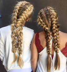 A somewhat messy part and braiding technique. 35 Gorgeous Ideas On Two French Braids For The Gorgeously Untamable Hair