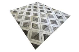 grey and white pyramids cowhide rug