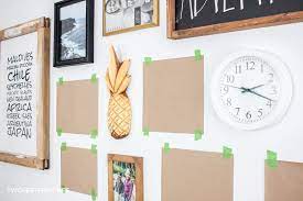 how to hang pictures without nails by