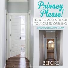 install a door in a cased opening