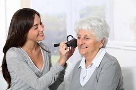 old woman to put makeup on stock photo