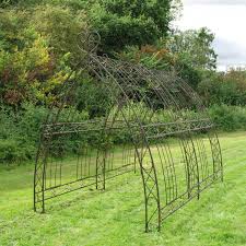 * plastic coated plant support with a metal core * rustproof with water tight closures on both ends *wont rot or split *lightweight for indoor or outdoor use *spurs. Bronze Gothic Metal Garden Tunnel Garden Ornamnents