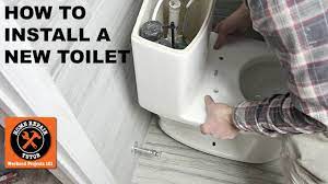 how to install a toilet american
