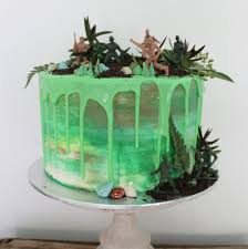 Read our full disclosure policy. Dino Safari Army Cake Regnier Cakes
