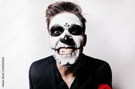 crazy young man with scary makeup