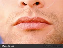 stubble male lips stock photo