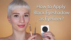 apply black eyeshadow as eyeliner