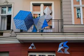 Germany's locked-in artists show off work on their balconies | The Star