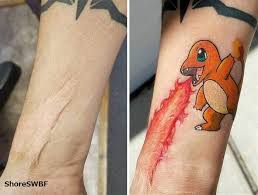 pokemon fan uses charmander tattoo to