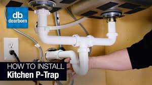 The drainpipe threads onto this pipe with a connector. How To Install A Kitchen P Trap Youtube