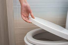 how to adjust the toilet tank water